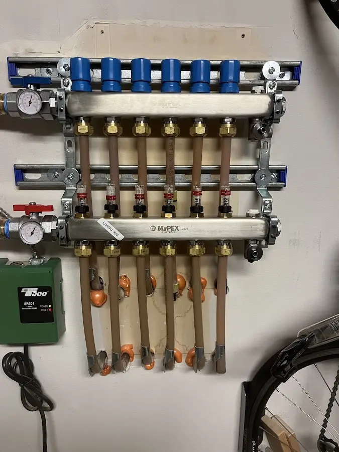 Plumber performing Gas Line Installation at a residential property in Danville